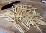 Upgrade your kitchen prep with our stainless steel crinkle cutter. Ideal for French fries, potato chips, and veggie snacks, this wavy slicer creates consistent cuts with a comfortable non-slip handle and easy storage hole.