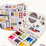 The Stitch & Go Kit portable travel sewing kit with multicolor thread, needles, scissors, buttons, pins and sewing accessories in a zippered case.